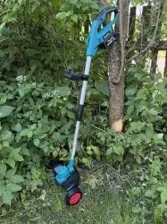 Фото Аккумуляторный триммер со съемными колесами Makita