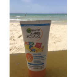 Garnier ambre solaire kids 50. Garnier Ambre solaire SPF 50 Kids. Детский солнцезащитный крем SPF 50 люмене. Ambre solaire для детей детский солнцезащитный Аква-крем, SPF 50. Гарньер солнцезащитный крем 50+.